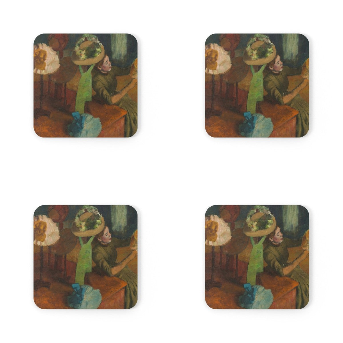 Four coasters printed with The Millinery Shop