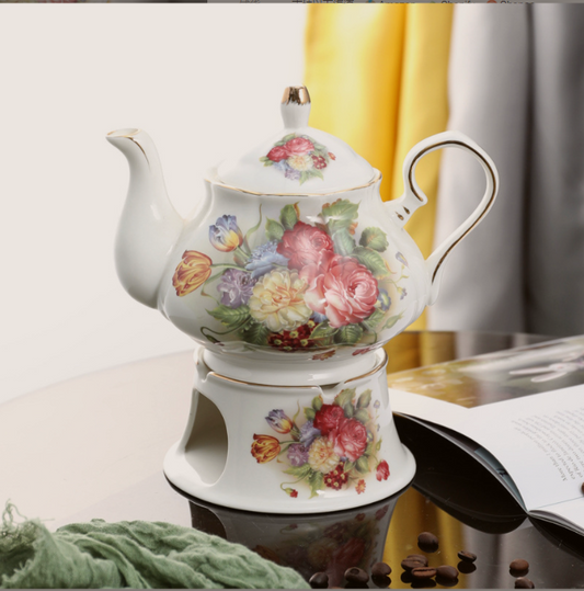 Vintage bouquet teapot on its warmer stand