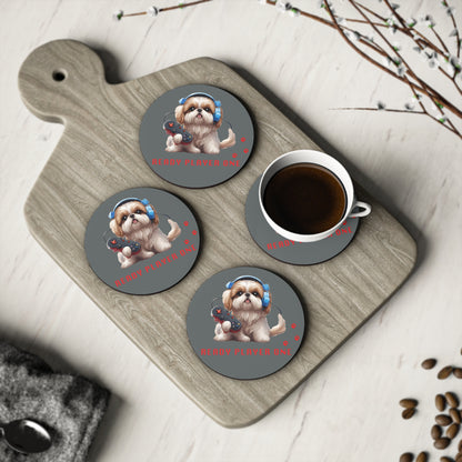 Four #18 Ready Player One round coasters on a board with a cup of coffee