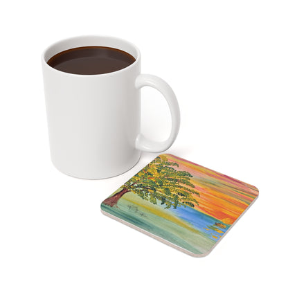 #13 Oasis coaster beside a mug of coffee