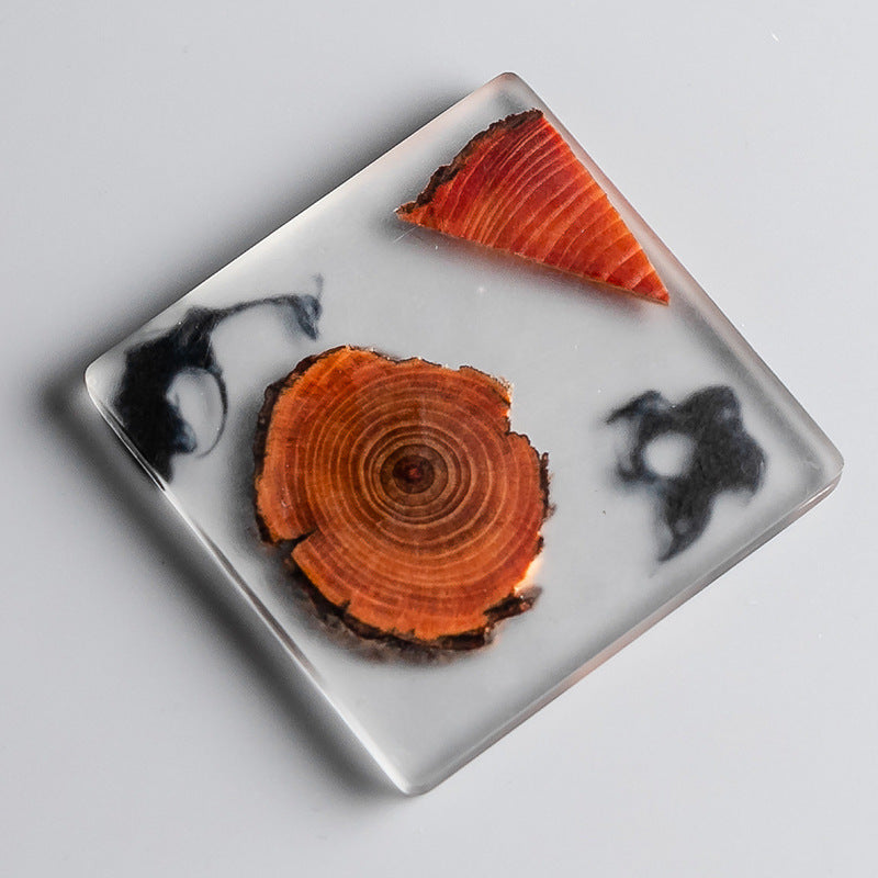 Resin pine coaster under a teacup