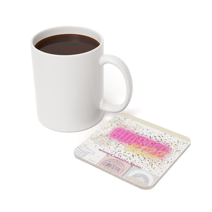 #1 Coaster Rizz Branded square coaster beside a mug of coffee