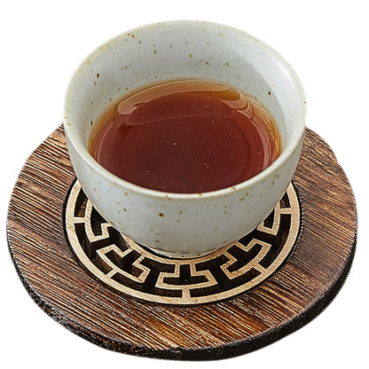 Carved wooden coaster, view 2