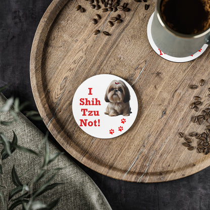 #19 I Shih Tzu Not round coaster on a wooden board beside a cup of coffee