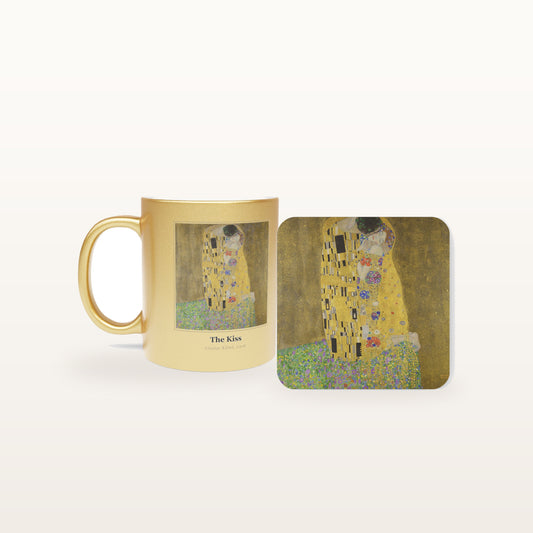 The Kiss mug and the matching coaster side by side, both printed with the painting