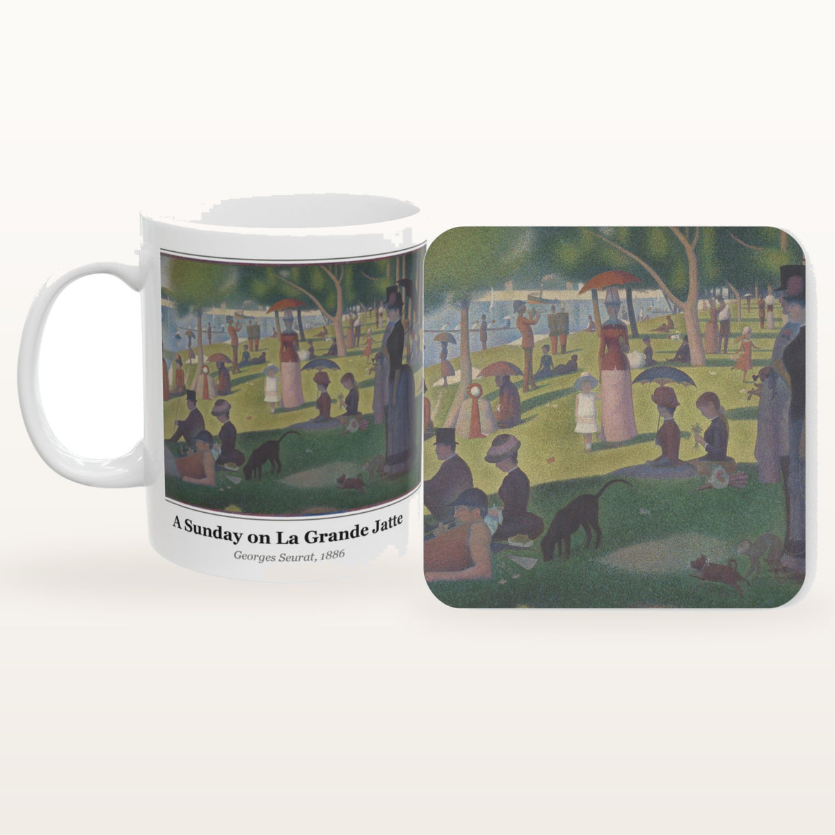 A Sunday on La Grande Jatte mug and the matching coaster side by side, both printed with the painting