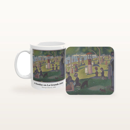 A Sunday on La Grande Jatte mug and the matching coaster side by side, both printed with the painting