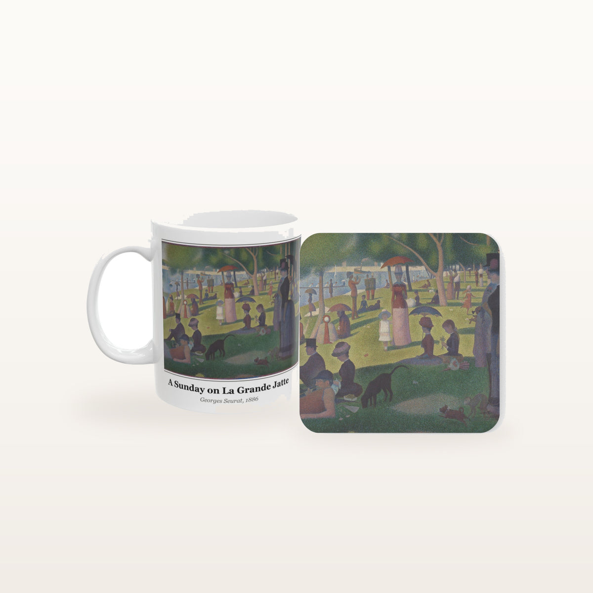 A Sunday on La Grande Jatte mug and the matching coaster side by side, both printed with the painting