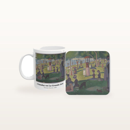 A Sunday on La Grande Jatte mug and the matching coaster side by side, both printed with the painting