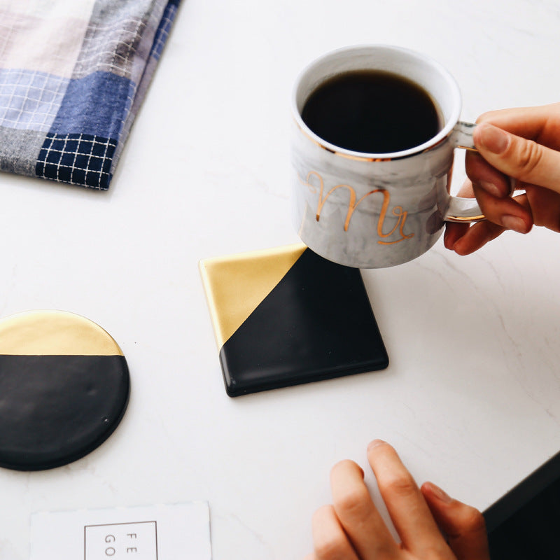 Black ceramic and cork coaster