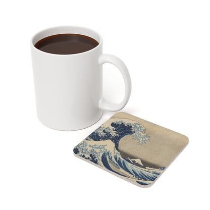 Under the Wave off Kanagawa coaster in use beside a mug of coffee