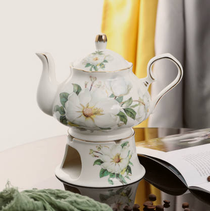 Camellia teapot on its warmer stand