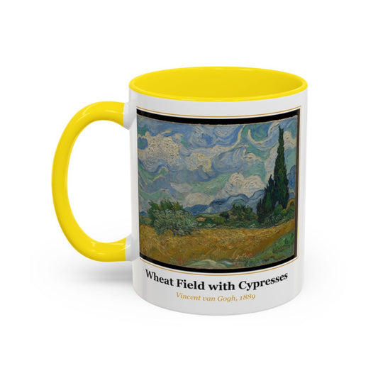 #52 Wheat Field with Cypresses mug — the framed painting with its title and artist beneath, as seen from across the table