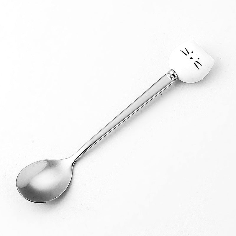 Spoon with ceramic handle