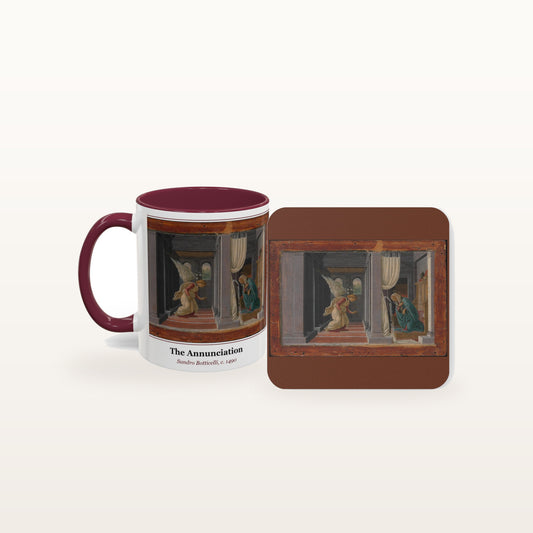 The Annunciation mug and the matching coaster side by side, both printed with the painting