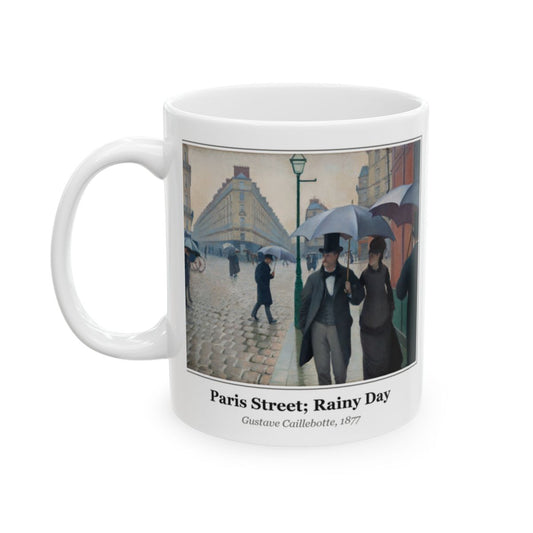 #73 Paris Street; Rainy Day mug — the framed painting with its title and artist beneath, as seen from across the table