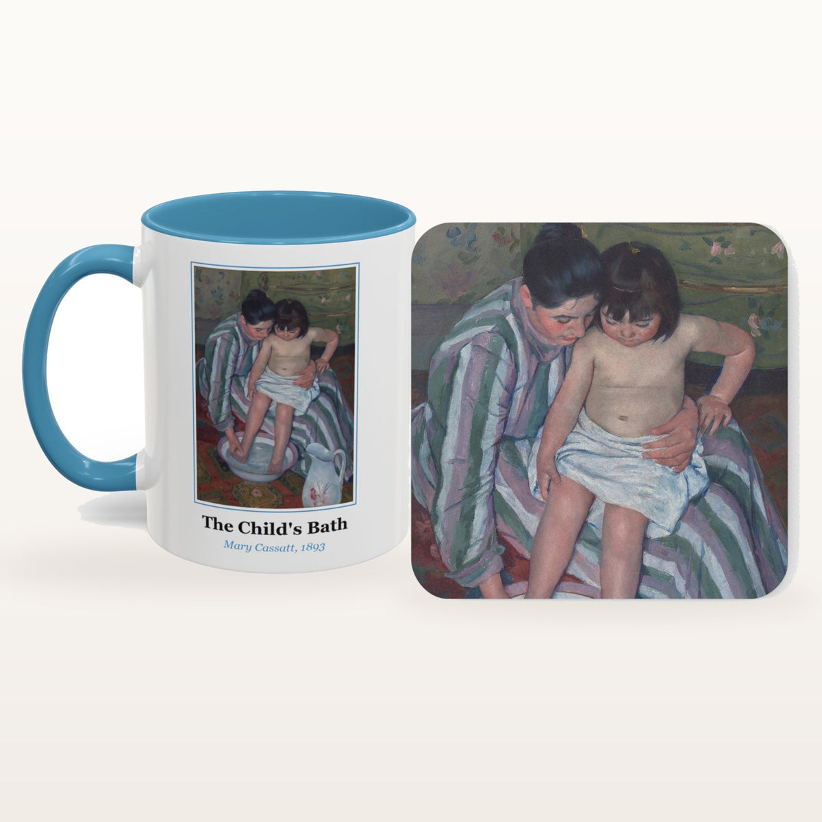 The Child's Bath mug and the matching coaster side by side, both printed with the painting