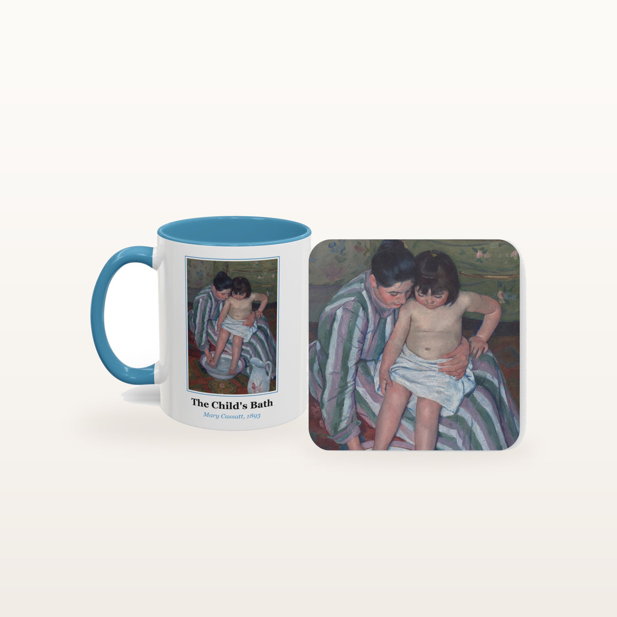 The Child's Bath mug and the matching coaster side by side, both printed with the painting