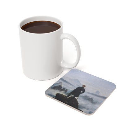 Wanderer above the Sea of Fog coaster in use beside a mug of coffee