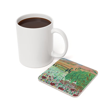 #15 Spring Field coaster beside a mug of coffee
