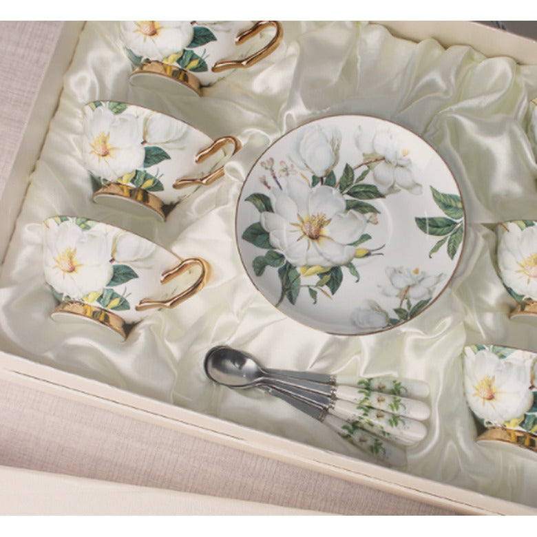 Close view of the camellia pattern on the cups and saucer