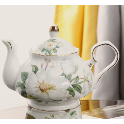 Close view of the camellia painted on the body of the teapot